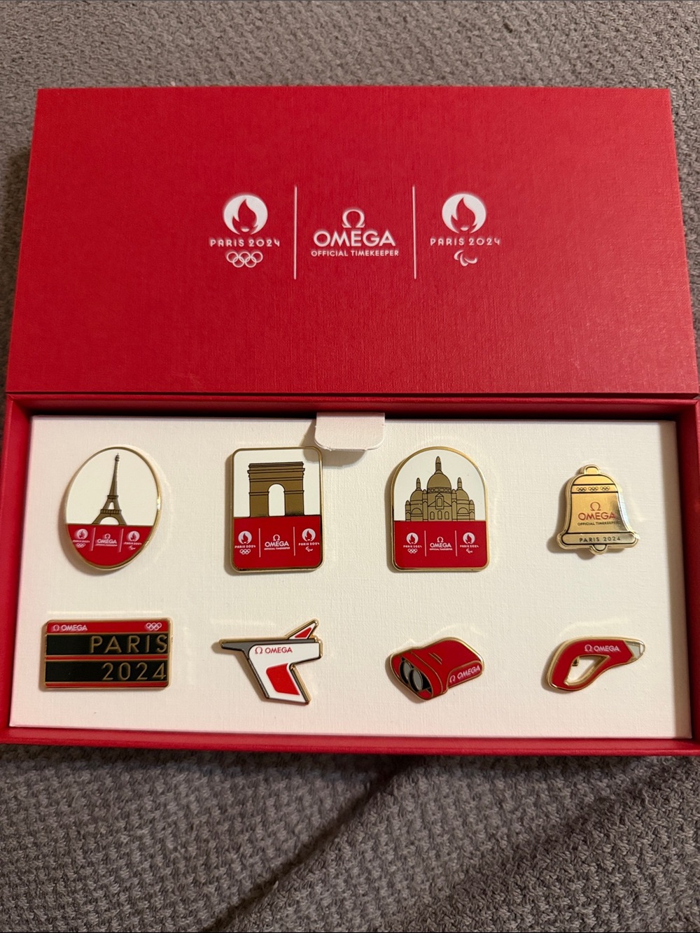 Omega Paris 2024 Red and Gold Collector Pin Set